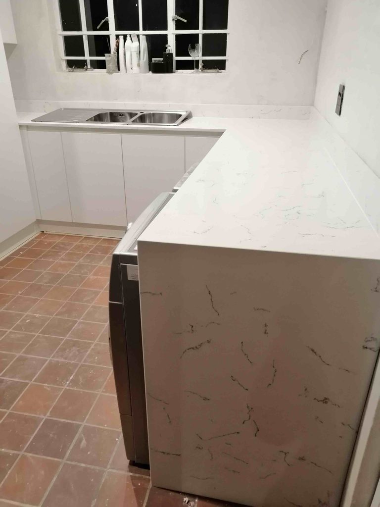waterfall whisper enduro quartz countertops 768x1024 1
